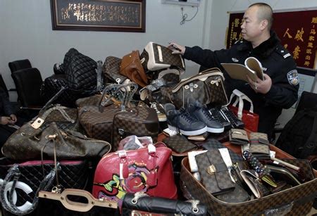 33 chinese arrested for fake bags|china counterfeit items.